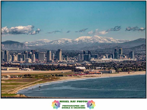 San Diego with snow-capped mountains in the background